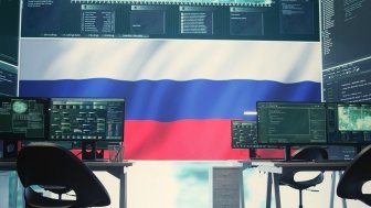 Governmental cyber operations room with Russian flag on big screen, focusing on information war and trolling. Highlighting the role of hackers in spreading