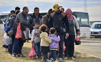 Refugees entering a refugee camp