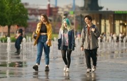 Moscow, Russia - June 1, 2022: Teenagers walking across the dry fountains.