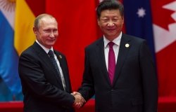 HANGZHOU, CHINA - SEPT. 4. 2016 - Chinese president Xi Jinping (R) welcomes Russian President Vladimir Putin (L) in G20 summit in Hangzhou.